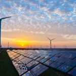 What are the carbon emissions for manufacturing solar panels and wind turbines?